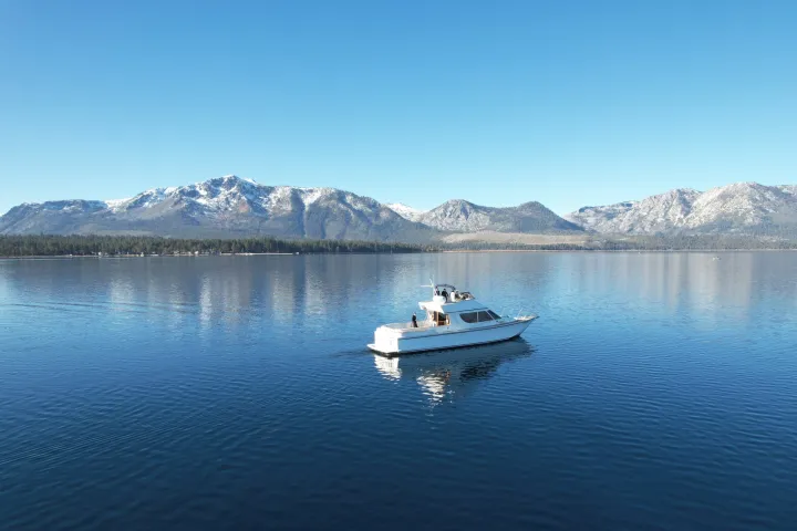 a small boat in a large body of water