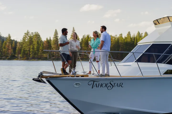 a group of people on a boat in the water