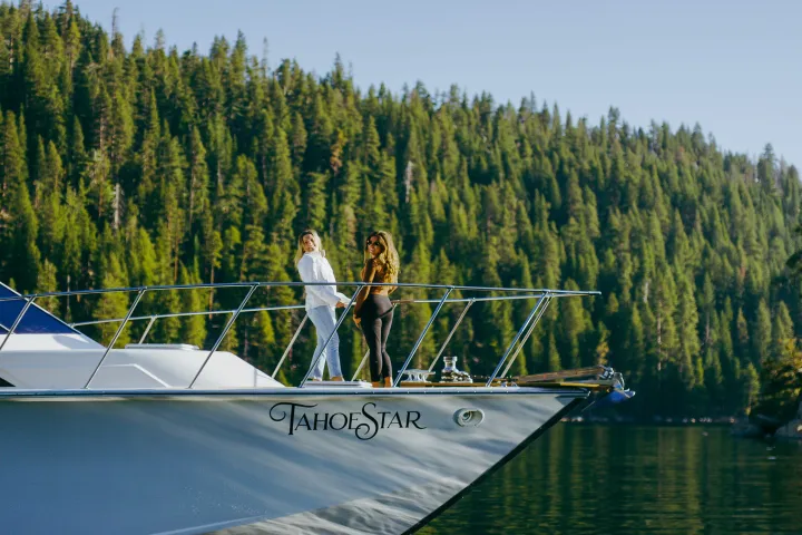 a group of people on a boat in the water