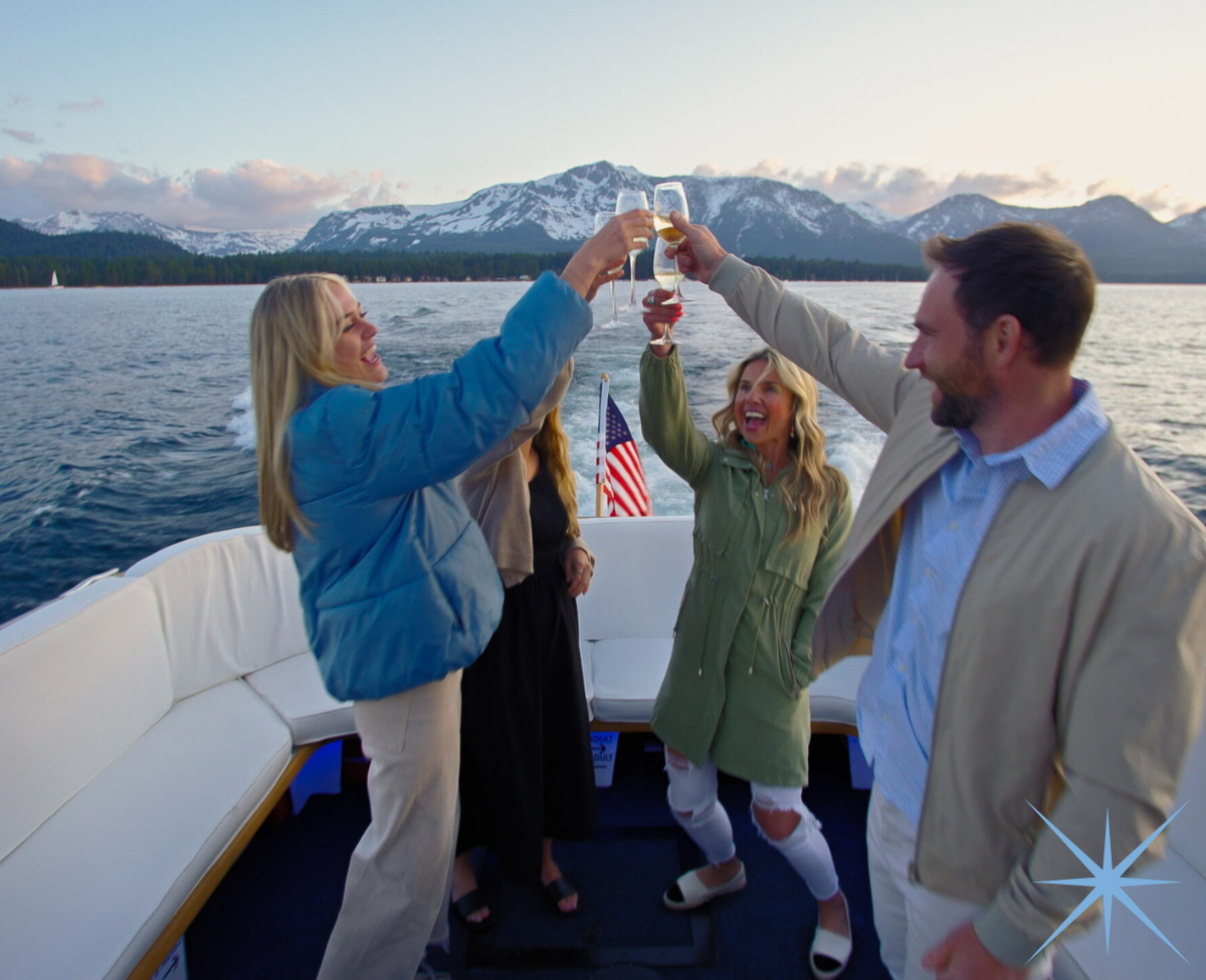 a group of people standing in front of water
