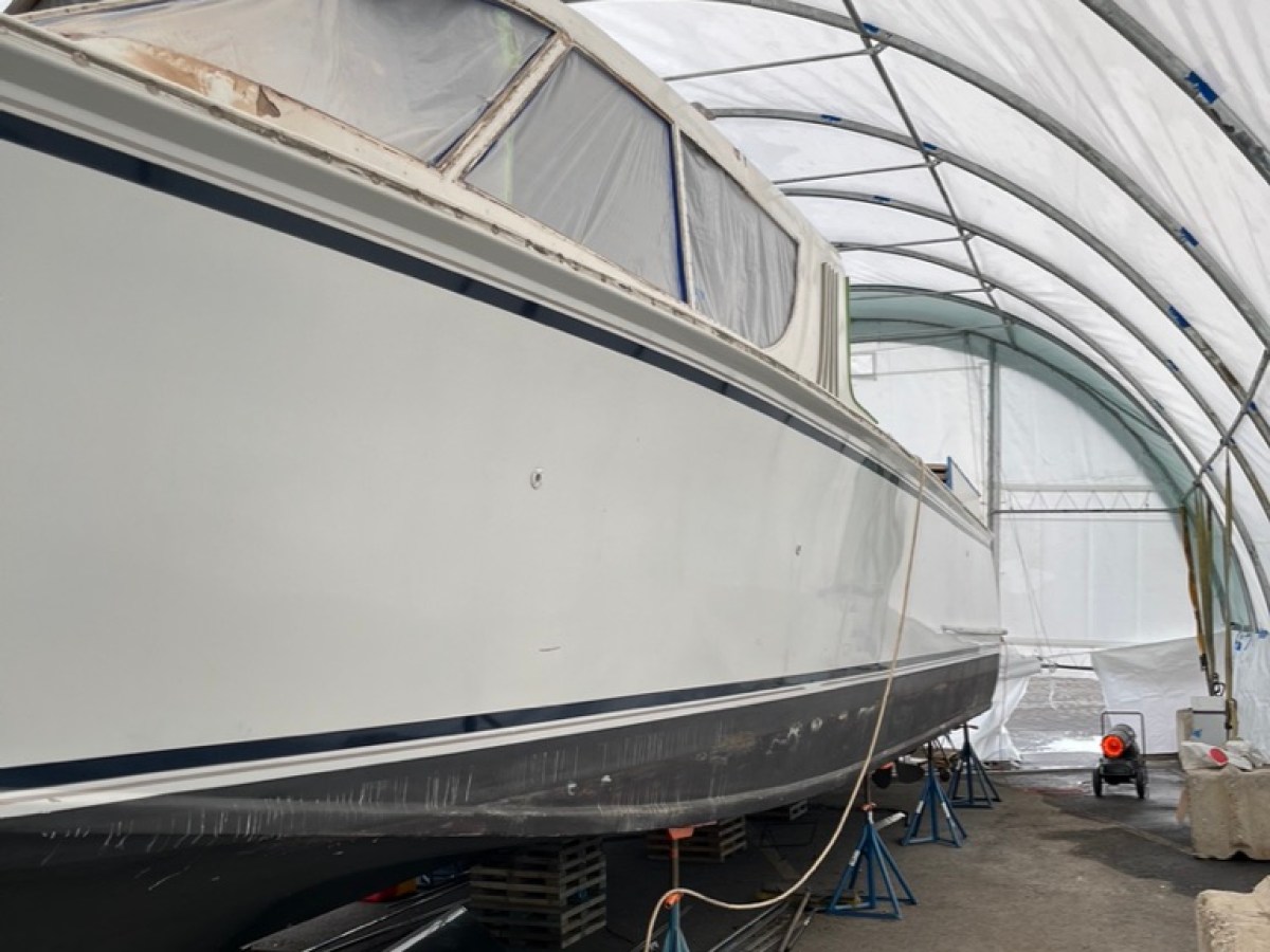 a boat sitting on top of a building