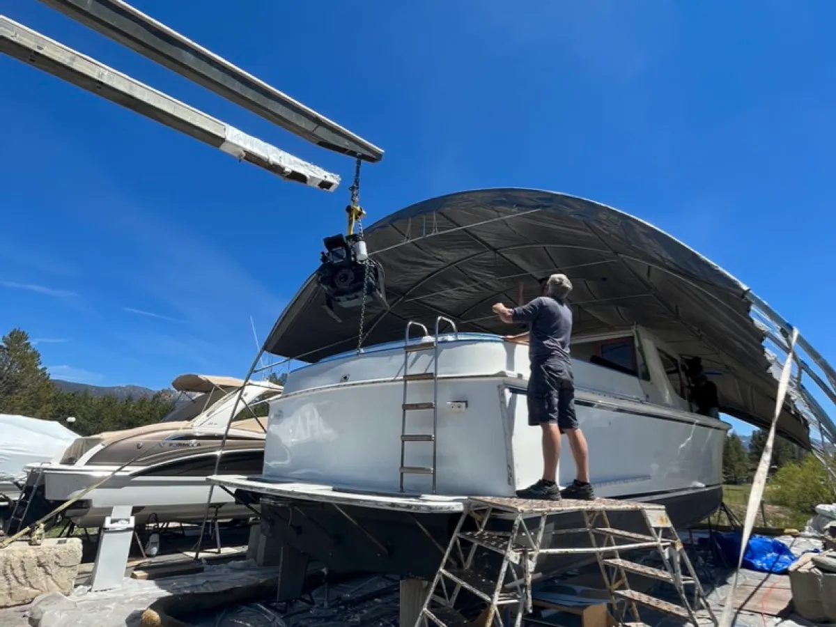 a plane sitting on top of a truck