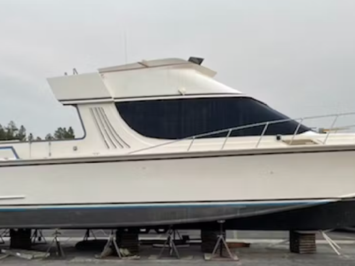 a plane sitting on top of a boat