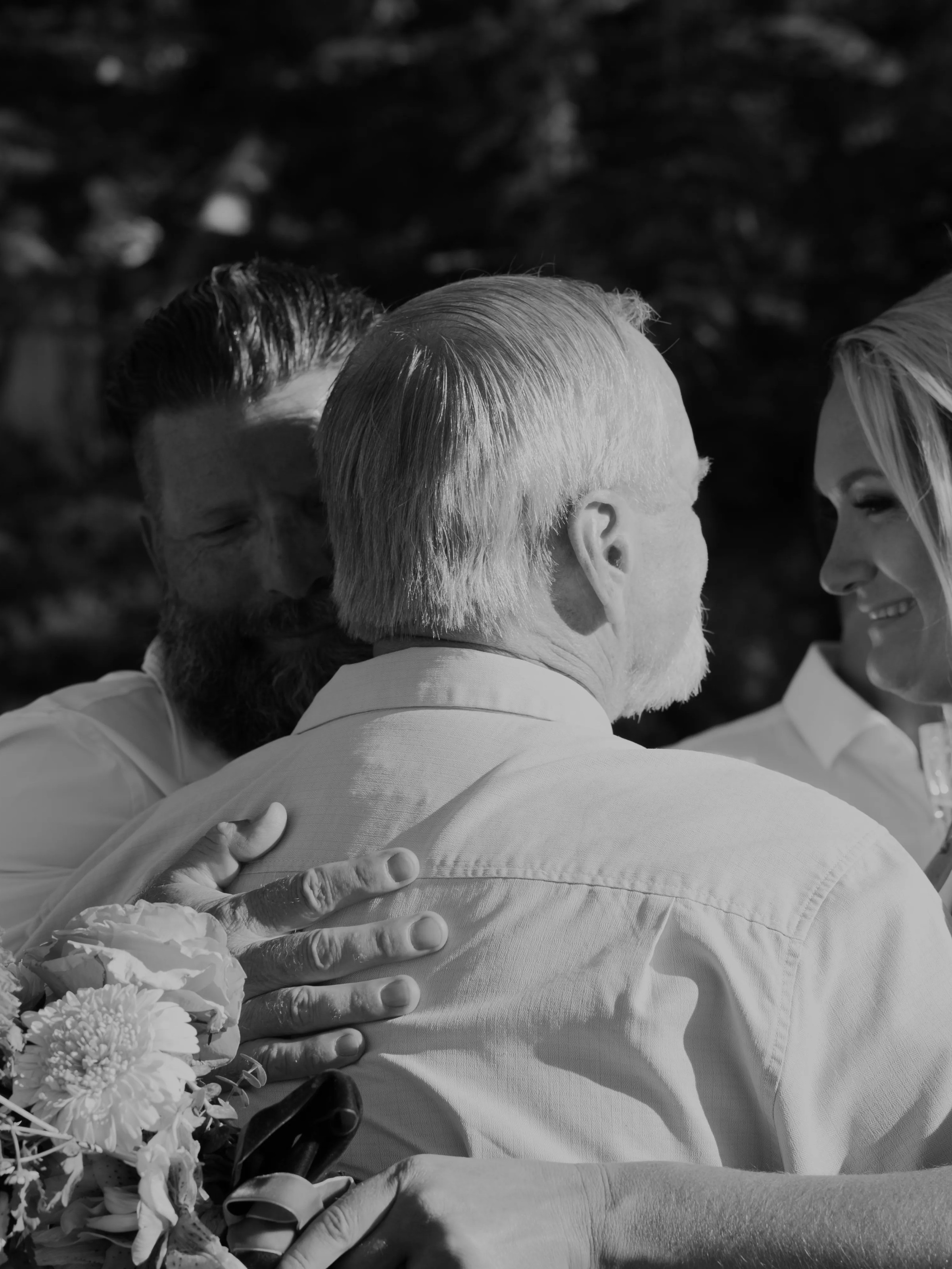 a man and a woman eating a donut