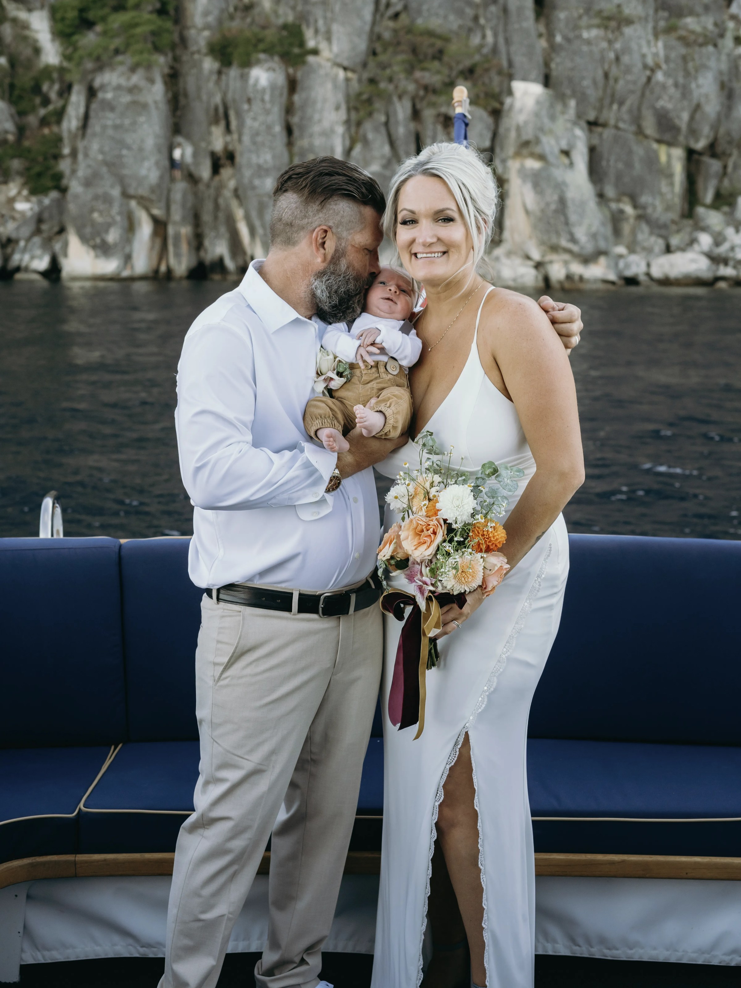 a woman standing in front of water