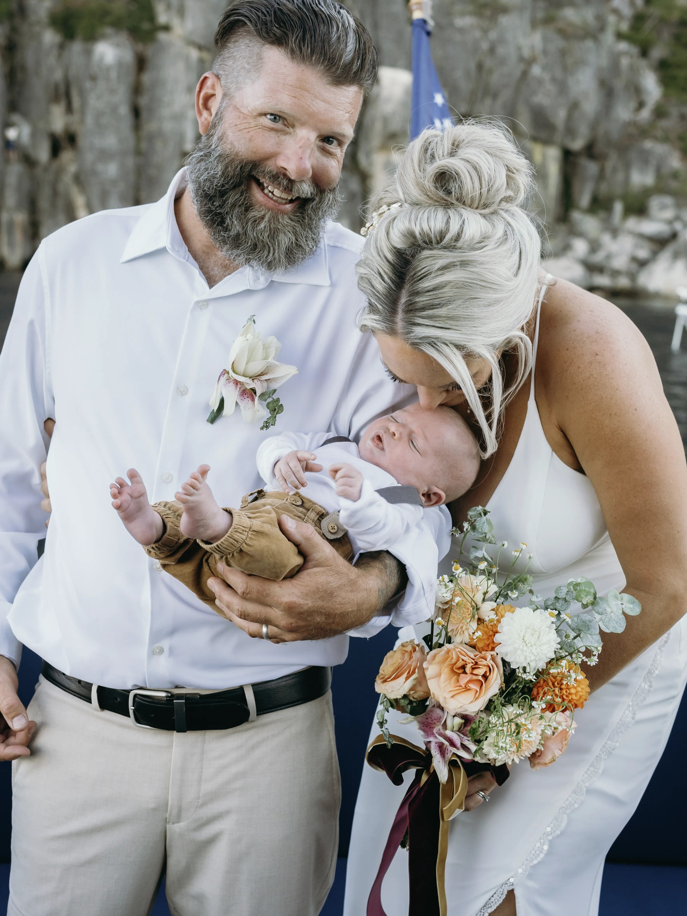 a man holding a stuffed animal