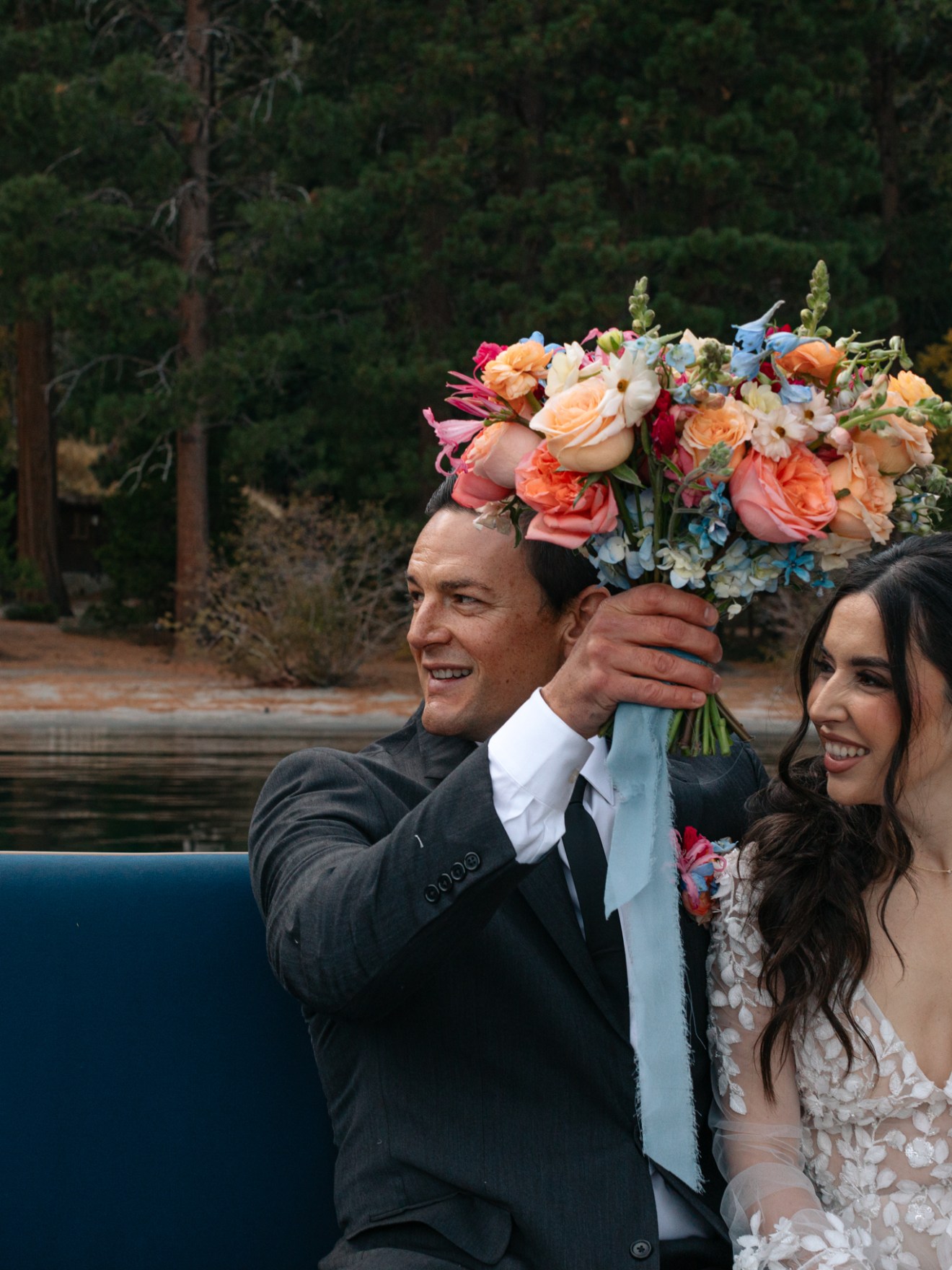 a woman standing in front of a river