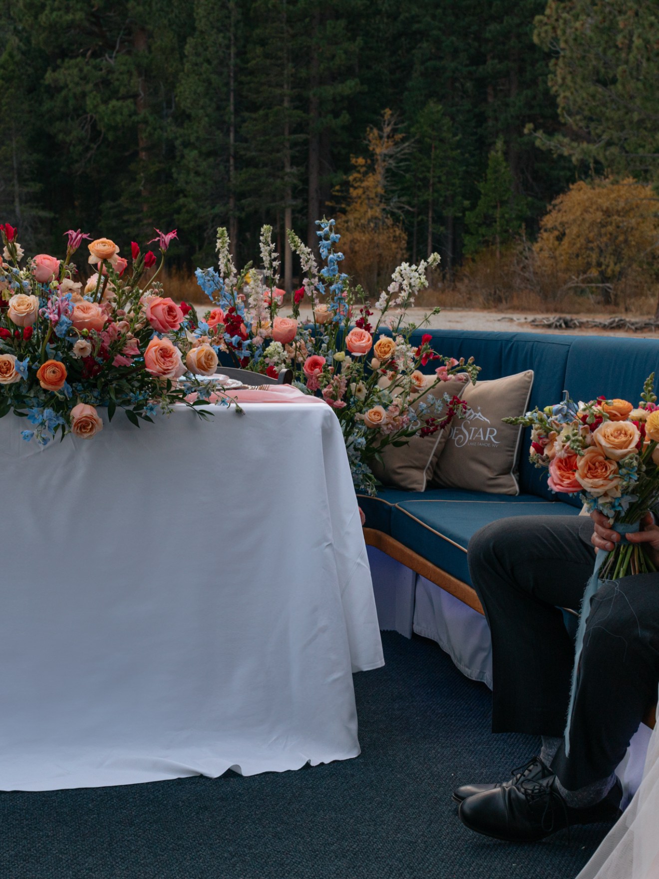 a group of people sitting at a wedding