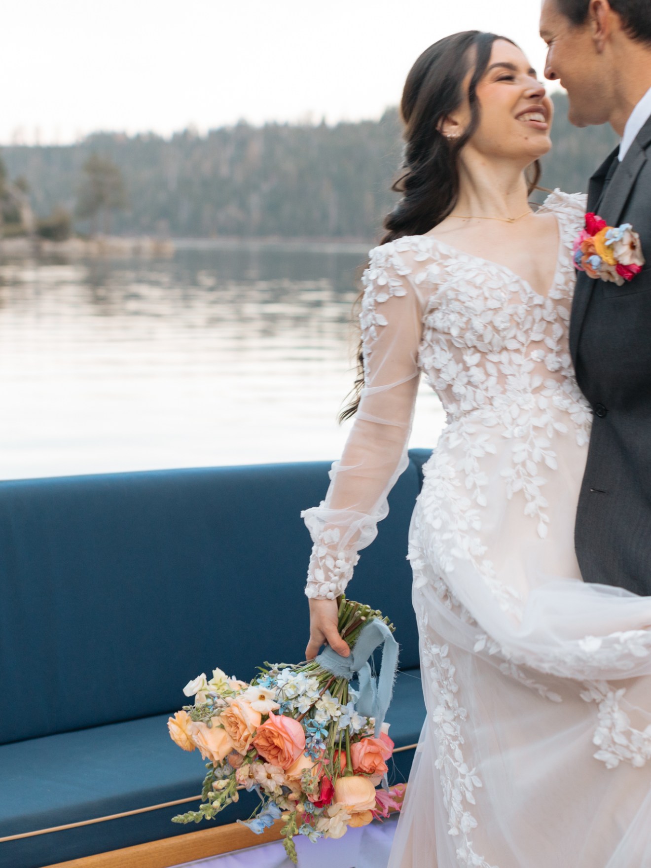 a person standing in front of a wedding cake