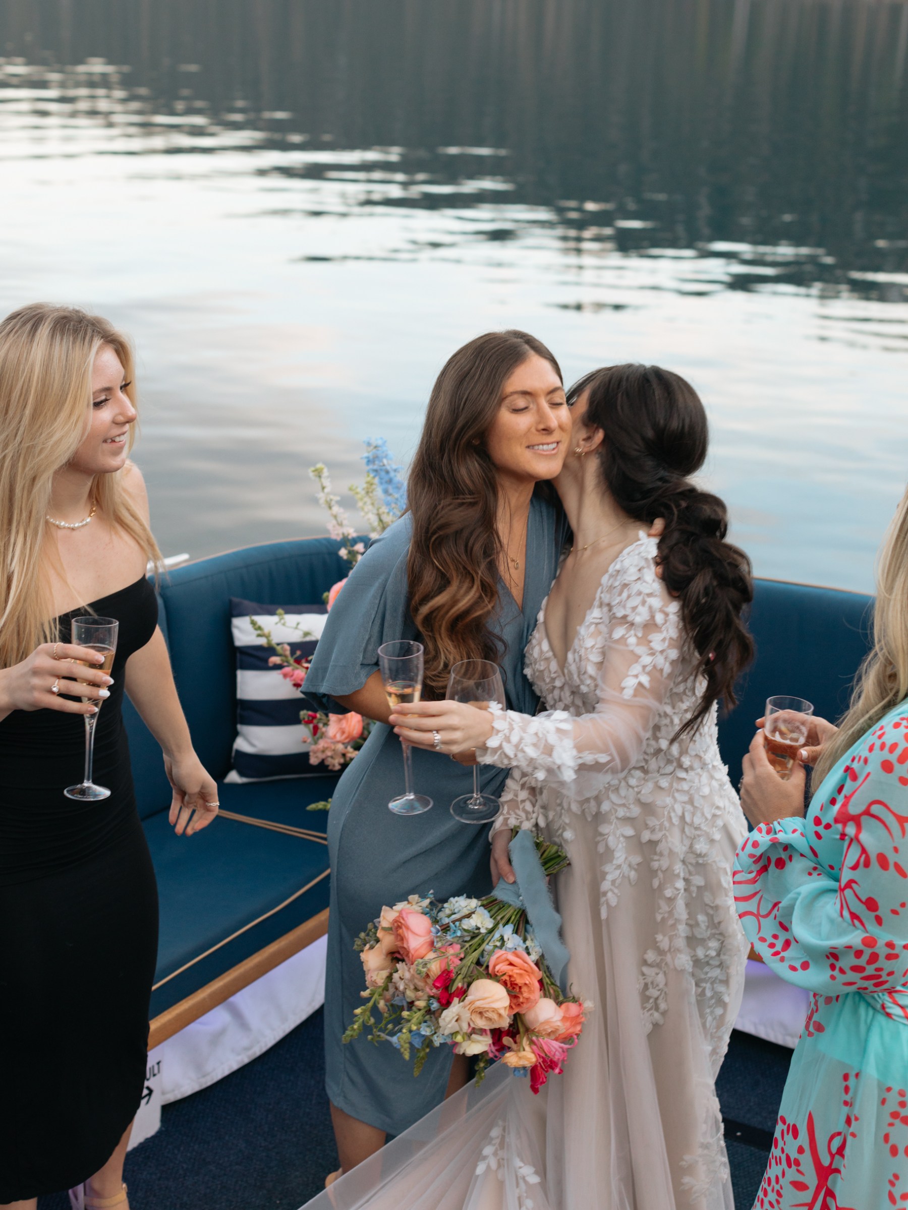 a couple of people that are standing in the water