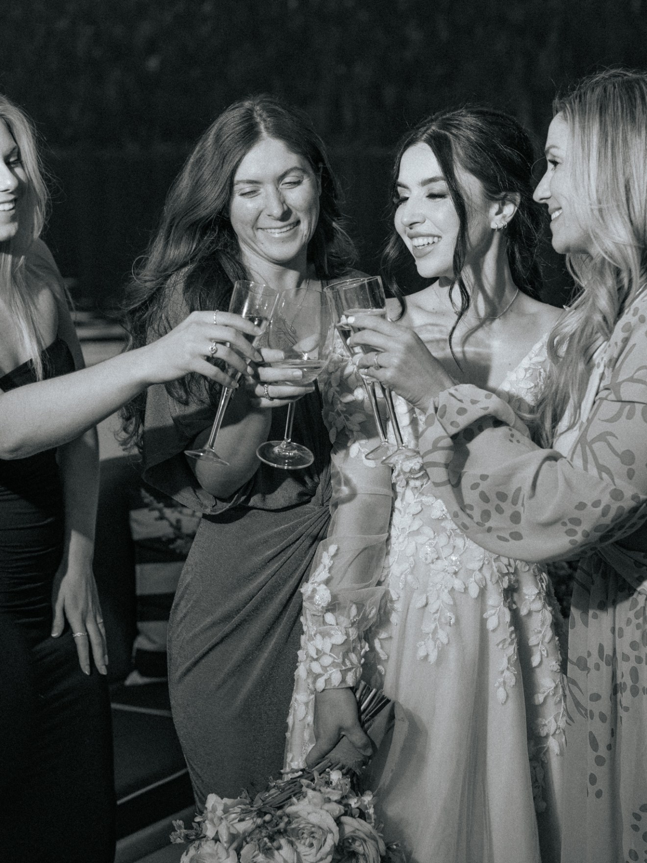 a couple of people standing next to a woman